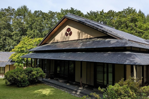 Traditional Japanese house with lush green garden in this luxury house for sale in Kohigashi ($1,813,184)