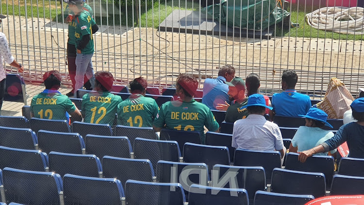 Supporters watching the ICC Cricket World Cup match between the Proteas and Pakistan at MA Chidambaram Stadium in Chennai, India, on Friday wear fake replica shirts with Quinton de Kock's surname misspelt 'De Cock'.