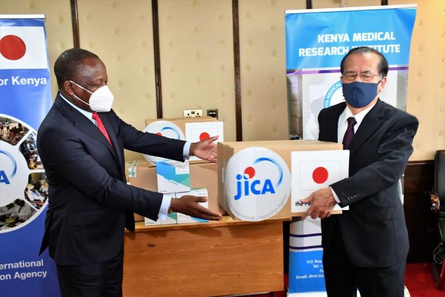 Health CS Mutahi Kagwe receives PCR kits donated by the Japan International Cooperation Agency at Afya House on June 4.