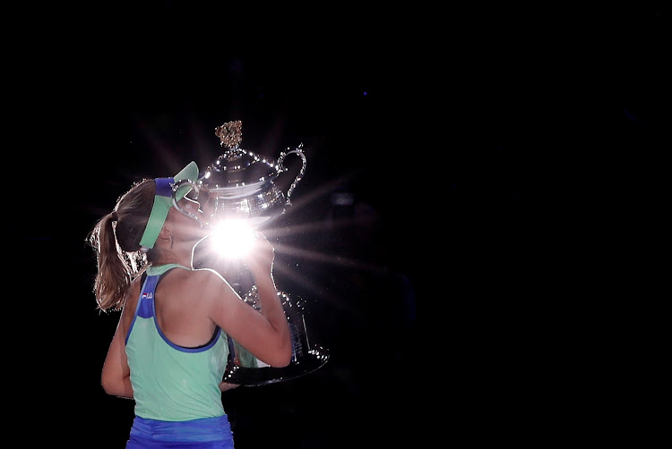 Sofia Kenin of the U.S. celebrates with the trophy during the 2020 Australian Open