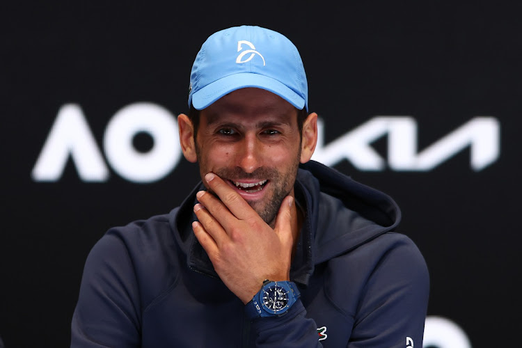 Novak Djokovic of Serbia talks to the media during a press conference ahead of the 2023 Australian Open at Melbourne Park on January 14, 2023 in Melbourne, Australia.