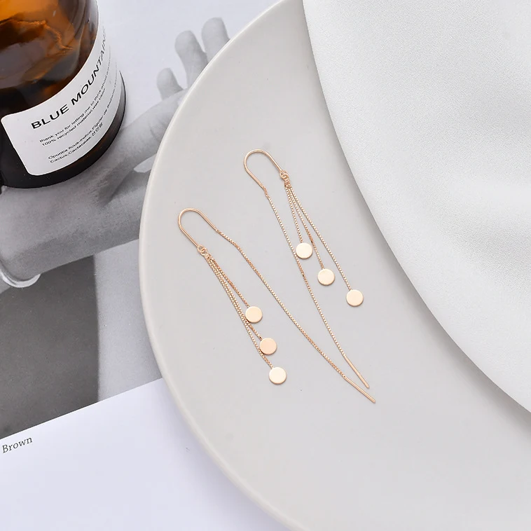 925 Sterling zilveren lange kwast oorbellen met schijfjes. Creëer een elegante uitstraling met deze opvallende, stijlvolle oorbellen.