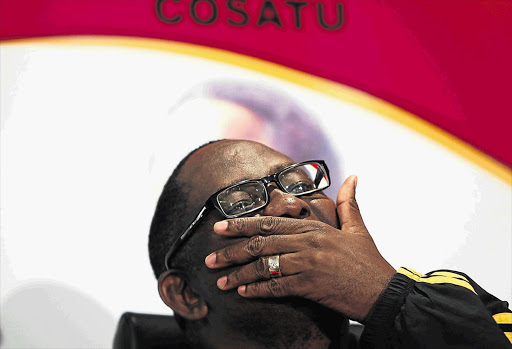 Cosatu general secretary Zwelinzima Vavi will keep his job pending outcome of an investigation.