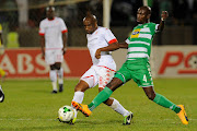 Surprise Moriri (L) of Highlands Park FC and Musa Nyatama of Bloemfontein Celtic during the Absa Premiership at Dr. Molemela Stadium on April 25, 2017 in Bloemfontein, South Africa.