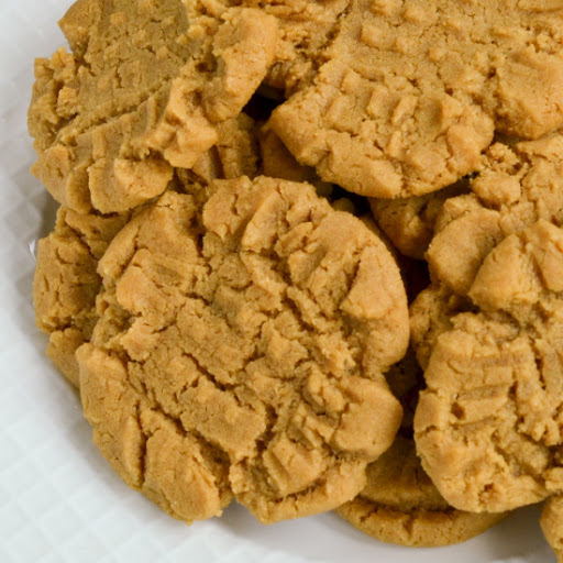 These quick and easy scrumptious Flourless Peanut Butter Cookies are prepped and in the oven in about ten minutes. Bake a batch for your family today.