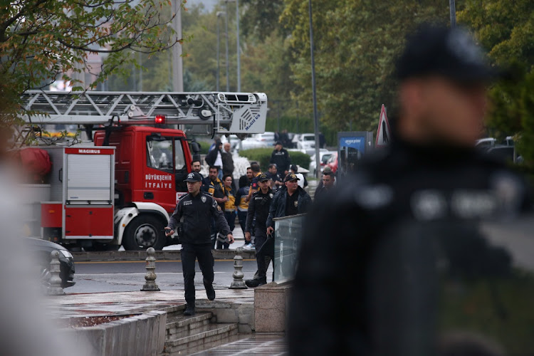 Police officers secure an area near the interior ministry following a bomb attack in Ankara, Turkey, on October 1 2023.