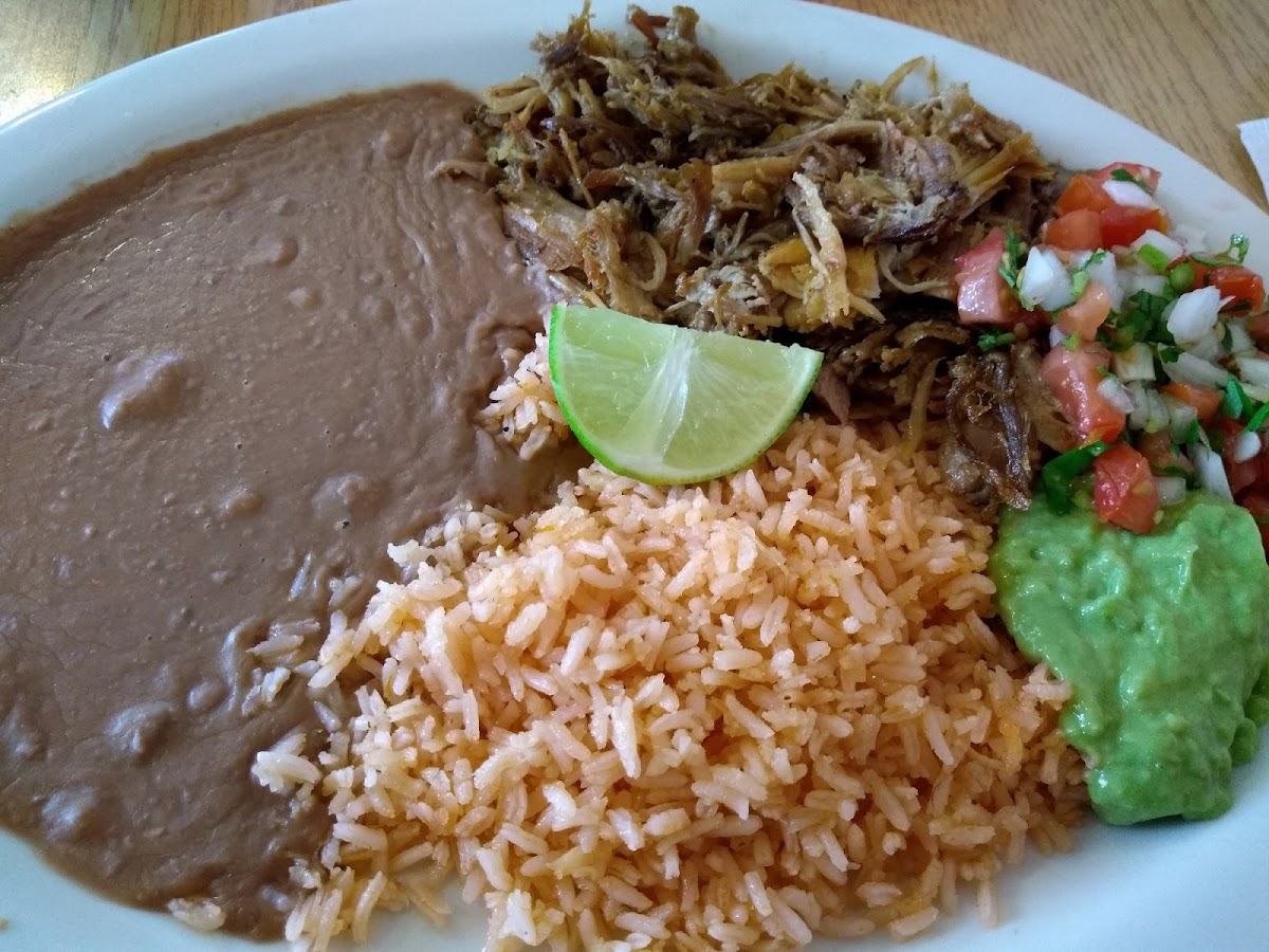 Carnitas with rice and beans.
