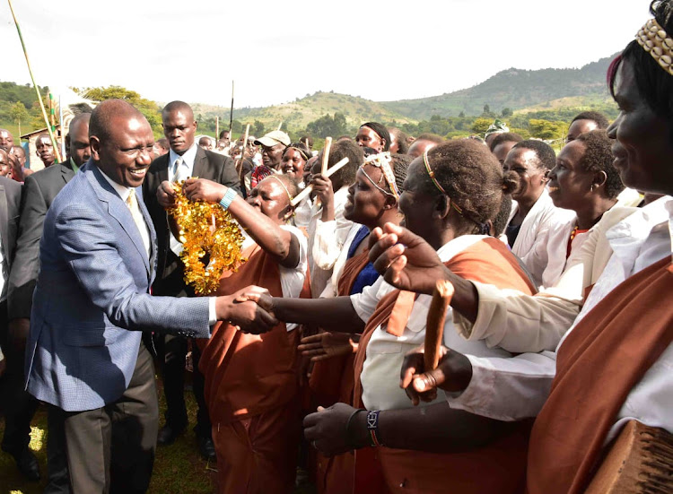 Deputy President William Ruto greets residents during a Elgeyo Marakwet County on June 16, 2019.