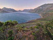 A car that plunged off Chapman's Peak Drive set the slopes of the mountain on fire. The driver, who was seriously injured, was taken to hospital.