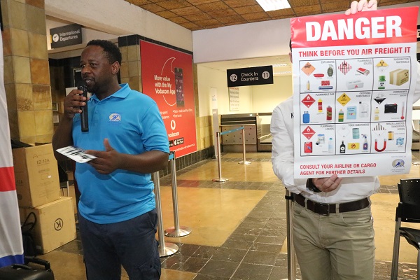 The Civil Aviation Authority's David Khumalo talks to airport users at Kruger Mpumalanga International Airport.