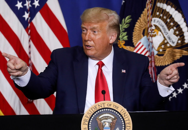 US President Donald Trump speaks during a roundtable on "Wisconsin Community Safety" after he surveyed property damage while visiting Kenosha in the aftermath of recent protests against police brutality and racial injustice and the ensuing violence after the shooting of Jacob Blake by a police officer in Kenosha, Wisconsin, US on September 1, 2020.