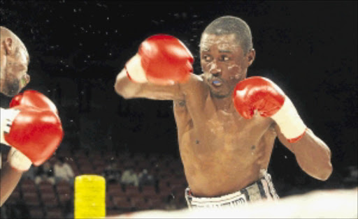 IBF CHAMP: Takalani Ndlovu. Photo: Antonio Muchave