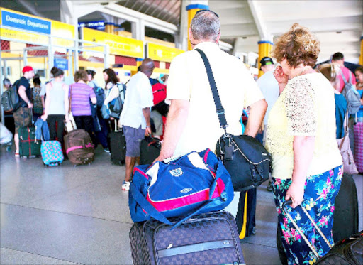 British tourists queue to check out at Moi International Airport in Mombasa, in a past visit/FILE