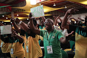 Members of the ANC sing and dance ahead of the opening ceremony of the 54th National Elective Conference in Nasrec, Johannesburg. The red carpet will once again be rolled out for the ANC106th birthday celebration in East London. 