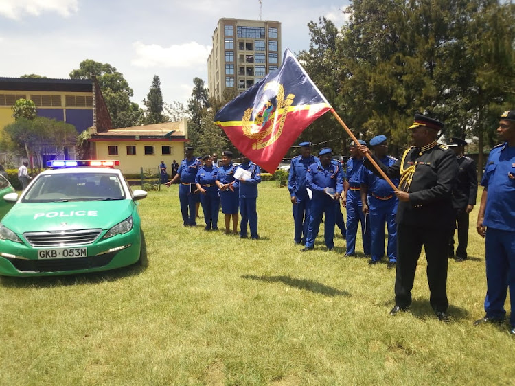 Inspector General of Police Hillary Mutyambai flags off a vehicle for mobile traffic patrol at the Kenya Police CID Training School in Nairobi on Monday, February 24, 2020