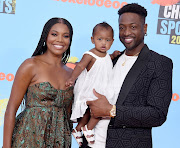 Gabrielle Union, Kaavia James Union Wade, and Dwyane Wade. (Photo by Gregg DeGuire/WireImage)