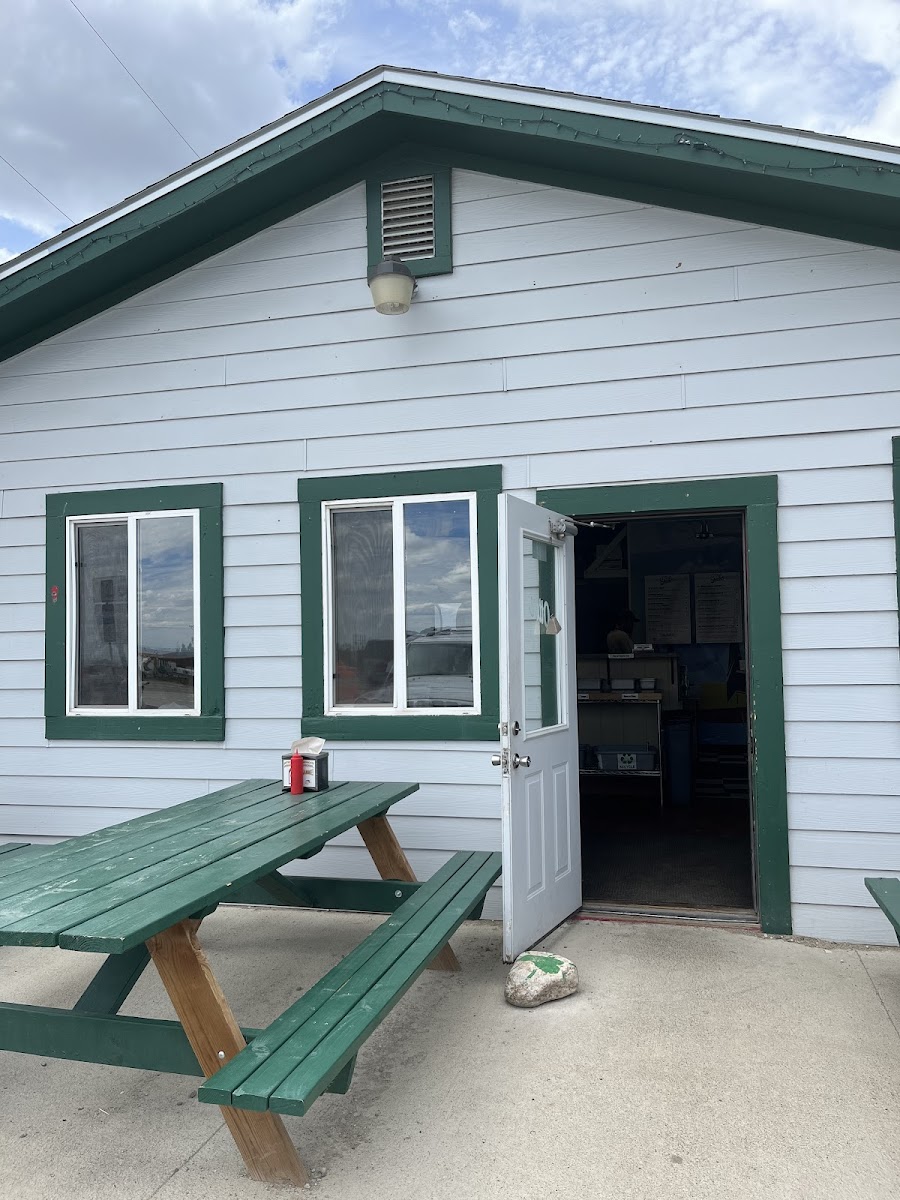 Several outdoor picnic benches