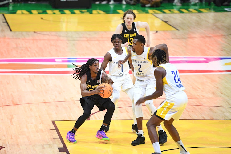 Cartier Ducati Diarra of Cape Town Tigers and Glofate Buiamba of Petro de Luanda during the 2024 BAL Kalahari Conference match at the SunBet Arena on Sunday