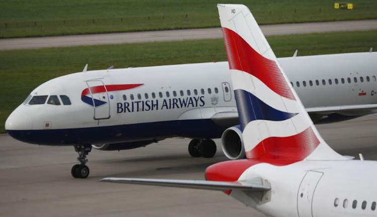 British Airways planes are parked at Heathrow Terminal 5 in London, Britain May 27, 2017. REUTERS/Neil Hall