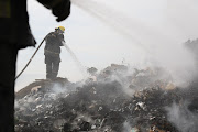 Firemen fighting the Msunduzi Landfill fire in Pietermaritzburg on Friday. 