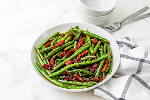 A serving bowl of Killer Green Beans.