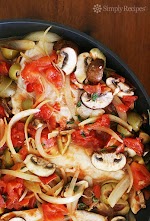 Tilapia with Olives, Mushrooms, and Tomatoes was pinched from <a href="http://www.simplyrecipes.com/recipes/tilapia_with_pimiento_sauce/" target="_blank">www.simplyrecipes.com.</a>