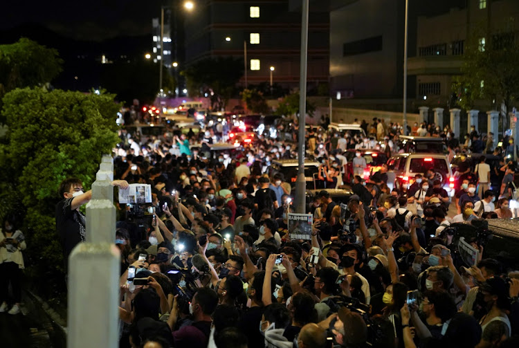 Copies of the the final edition of Apple Daily are handed out to supporters, at the headquarters of Apple Daily in Hong Kong, China June 24, 2021.