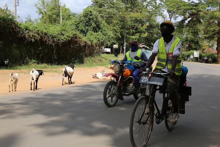 Fredrick Ochieng' cycles to create Covid-19 awareness in Kitui town