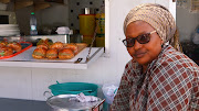 Nontobeko Gogontya runs a food stall at Cape Town's station deck taxi rank. 