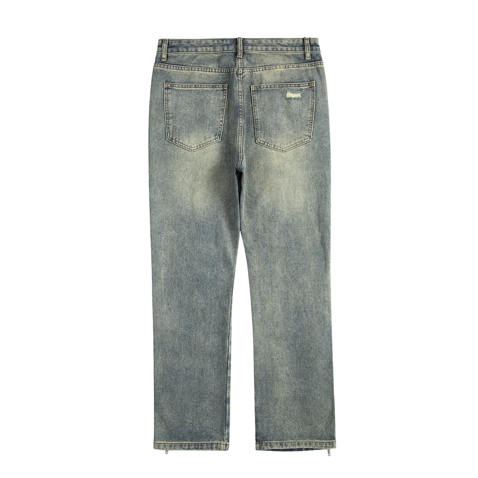 Jeans Rasgados con Abertura de Cremallera en el Pecho. Destaca tu estilo con estos vaqueros únicos. Diseño moderno y favorecedor para un look audaz y sensual.
