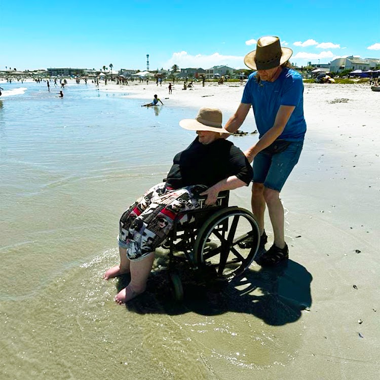 Susanna Pienaar gets her feet wet in the sea at Melkbosstrand for the first time in 17 years.