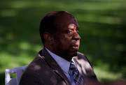 Lee Elder, the first African-American to play in the Masters, watches practice rounds ahead of The Masters at Augusta National Golf Club, Augusta, Georgia on November 9, 2020  
