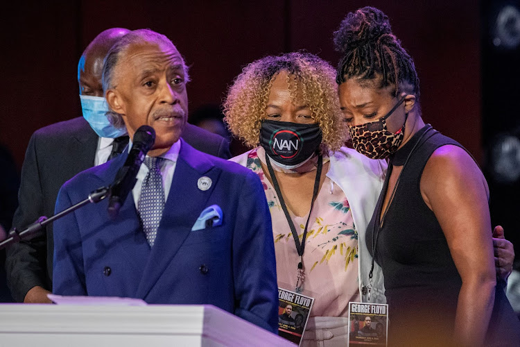 Actor Tiffany Haddish hugs Eric Garner's mother, Gwen Carr, while Reverend Al Sharpton speaks during a memorial service for George Floyd following his death in Minneapolis police custody, in Minneapolis, Minnesota, U.S., June 4, 2020.