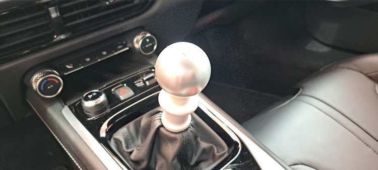 Not something you see every day in a sportscar: a manual gearshifter. Picture: DENIS DROPPA