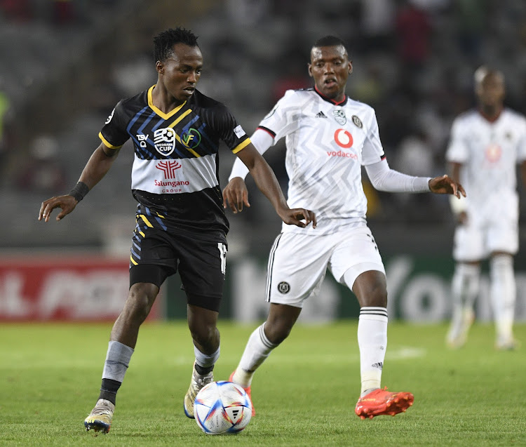 Orlando Pirates midfielder Kabelo Dlamini challenges Khgothatso Mariba of Venda Football Academy during their Nedbank Cup Last 16 match between at Orlando Stadium.