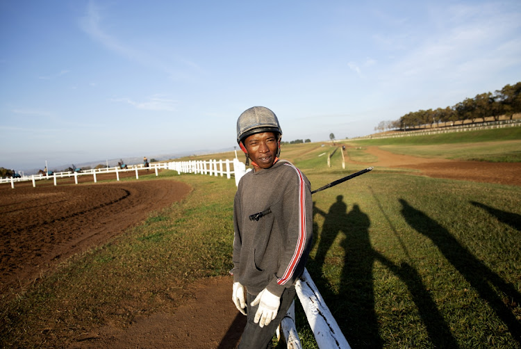 Doctor Lembede photographed while chatting to Michael Roberts during horse training at Summerveld Horse Training Centre in KwaZulu-Natal.