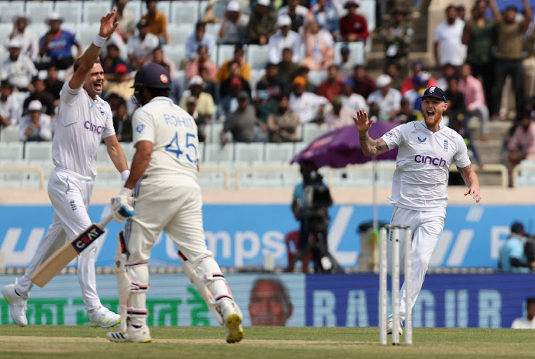 England's James Anderson celebrates after taking the wicket of India's Rohit Sharma, caught out by Ben Foakes.