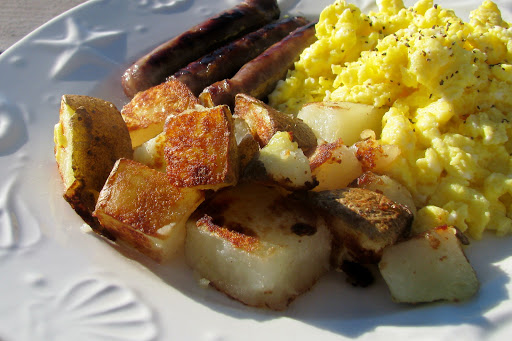 Pan fried potatoes with sausage and eggs