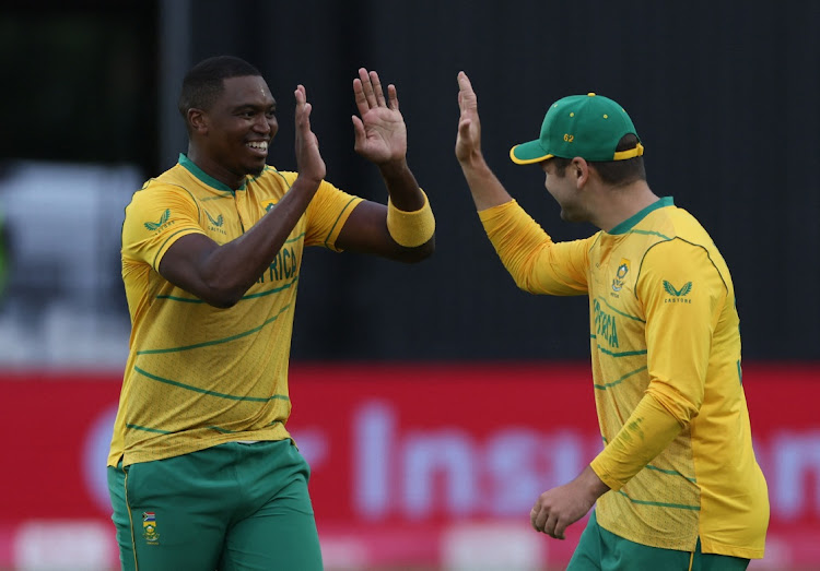 SA's Lungi Ngidi celebrates the wicket of England's Jason Roy with a teammate in the first T20 at the Bristol County Ground.