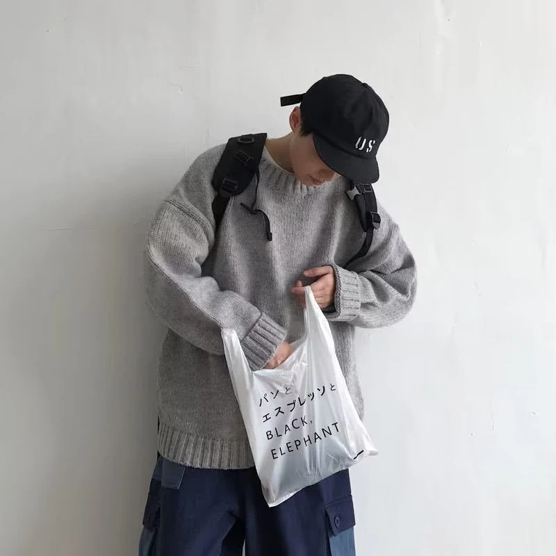 Hong Kong Style ronde hals gebreide trui met lange mouwen, losvallend en veelzijdig combineerbaar, ideaal voor een casual look.