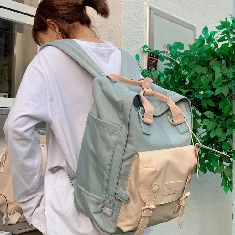 Student Waterproof Nylon Backpack Classic Natural Macarons. Carry your books, laptop, and snacks in style and safety, pr
