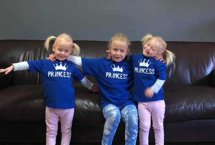 Two-year-old twins Karla and Maya and their six-year-old sister Liane. File photo.