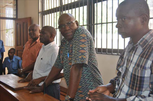 From (right) Daniel Chiwai Chiriba,Ganze MP Peter Shehe,Emmanuel Mwagambo Sanga at the dock in Malindi law courts yesterday.Photo Alphonce Gari