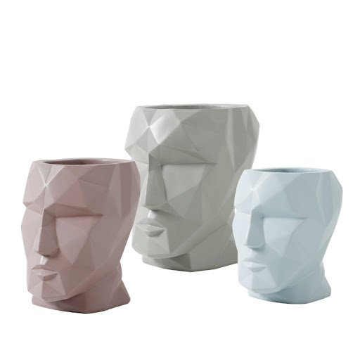 Title 3, Creative face vase transforms your flowers into...