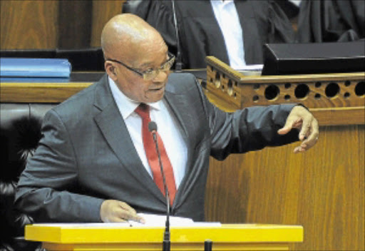 SPEAKING OUT: President Jacob Zuma replies to a question during a debate in Parliament . photo: Kopano Tlape