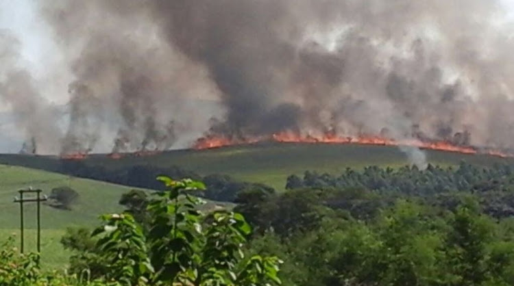 Angry residents in the farming district of eShowe are believed to have torched a farm and farmhouse after a fisherman was shot dead.