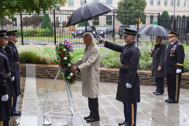 US President Joe Biden, centre left, attends a wreath laying ceremony at the Pentagon in Arlington, Virginia, the US, September 11 2022. Picture: LEIGH VOGEL/UPI/BLOOMBERG