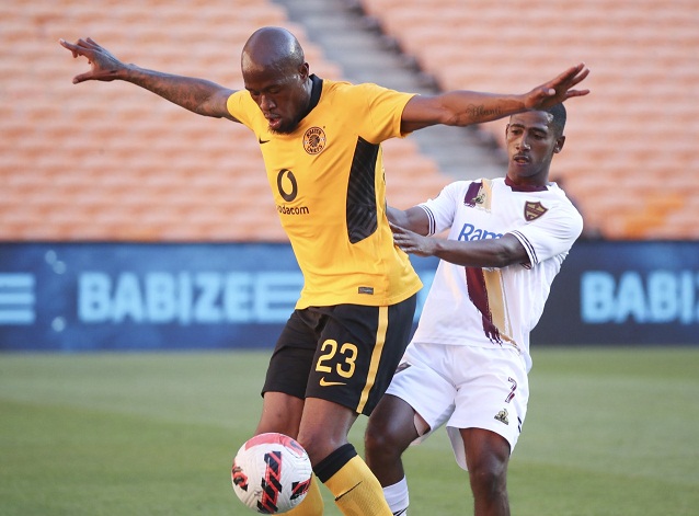 Sifiso Hlanti of Kaizer Chiefs shields the ball from Deano van Rooyen of Stellenbosch FC in the DStv Premiership match at FNB Stadium on November 2 2021.