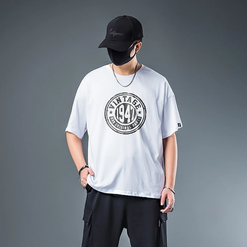 T-shirt décontracté en coton, col rond, fil double, grande taille pour un confort optimal et une résistance accrue, idéal au quotidien