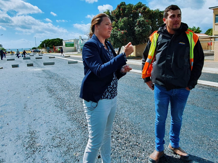 DA Eastern Cape legislature member Vicky Knoetze and SP Excel construction supervisor Wynand Human on the new plastic road in Woltemade Street in Jeffreys Bay